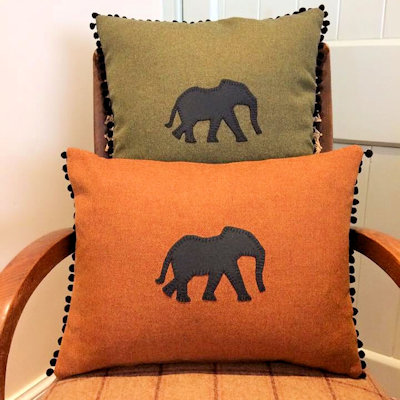 Tweed animal motif cushion